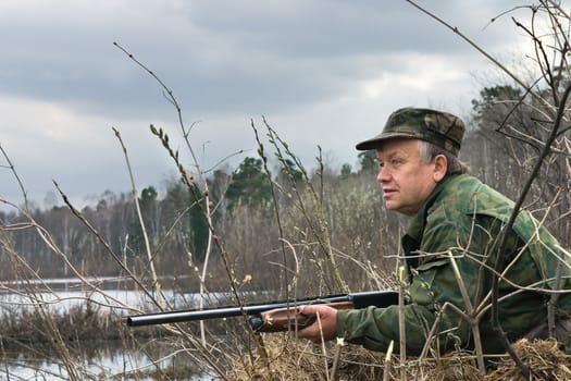 The hunter has noticed flying up wild ducks 