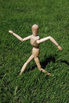 art model man running in the grass