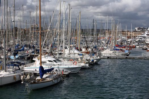 Tall luxury boats and yachts moored in duquesa Port In Spain, Barcelona