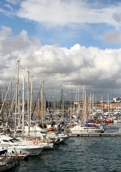Tall luxury boats and yachts moored in duquesa Port In Spain, Barcelona