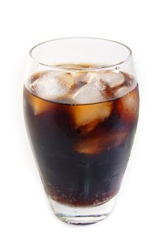 Glass of cola on bright background
