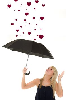 Young woman receiving many hearts. Over white background.