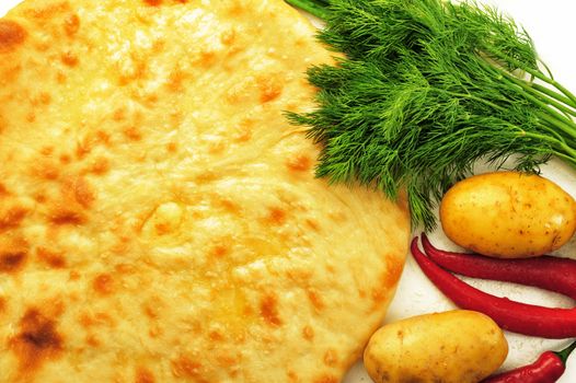 food composition made of flat cake, potato, cayenne, parsley and spring onion