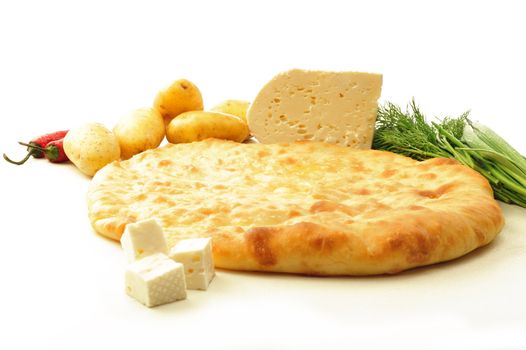  food composition made of flat cake, potato, cheese and spring onion