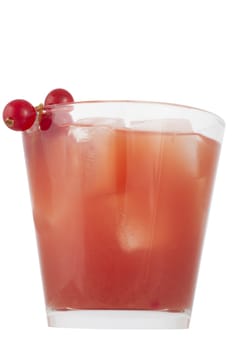 Healthy red juice drink with red currant berries as garnish, isolated on a white background.