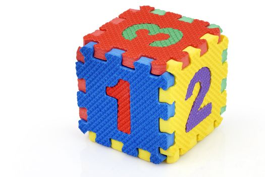 Fun colorful toy puzzle cube or dice in textured foam for kids to learn their numbers, here 1,2,3.