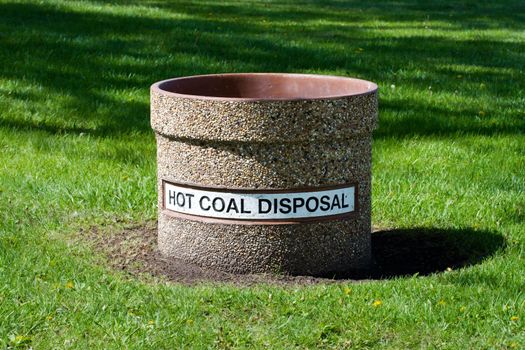Hot Coal Disposal container at a park.