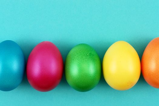 bright pastel colored easter eggs on  background