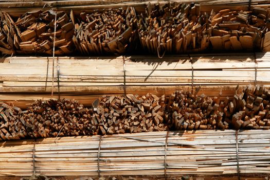 Close-up of a woodstack against a very blue sky