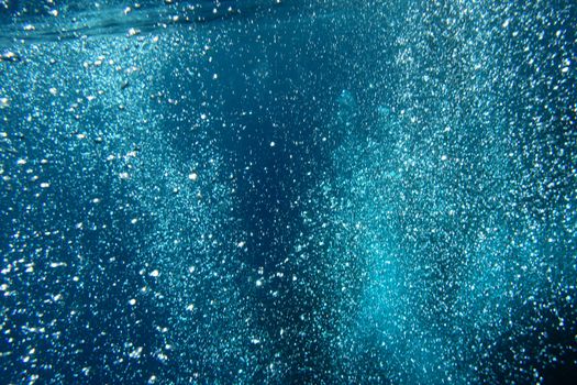 bubbles in fresh blue clear water in the red sea