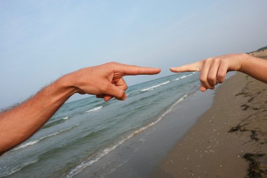 hands on the beach. on a nice day