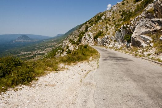 Narrow danger route in Montenegro near Skadarsko lake - Balkans