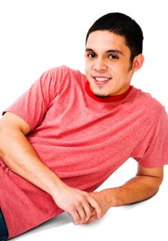 Man reclining on the floor isolated over white