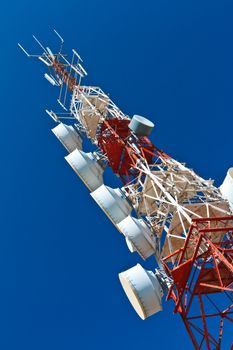 Communications tower with a beautiful blue sky