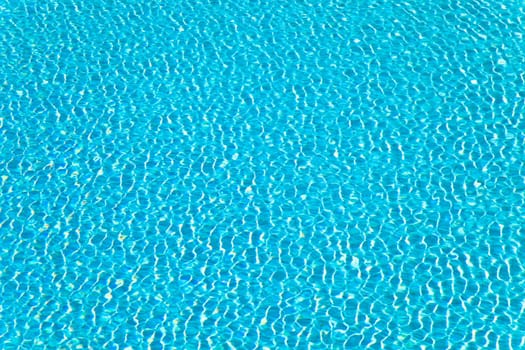 Abstract composition of the water of a swimming pool and its reflections