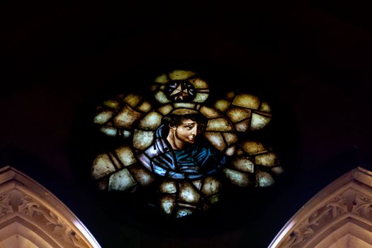 Wonderful ancient stained glass window formed of multiple colors