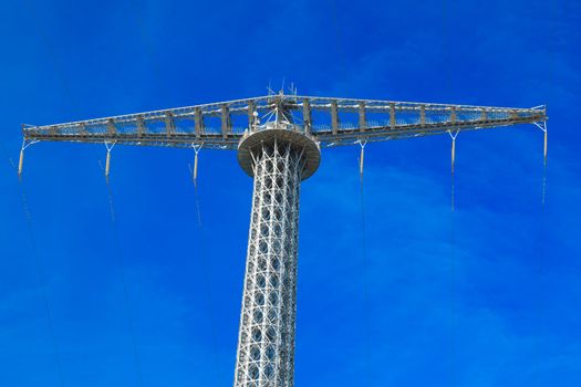 Communications tower with a beautiful blue sky