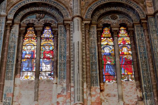 Wonderful ancient stained glass window formed of multiple colors