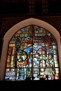 Wonderful ancient stained glass window formed of multiple colors