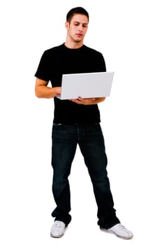 Man using a laptop and posing isolated over white