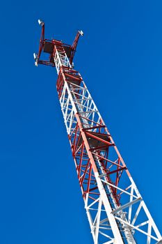 Communications tower with a beautiful blue sky