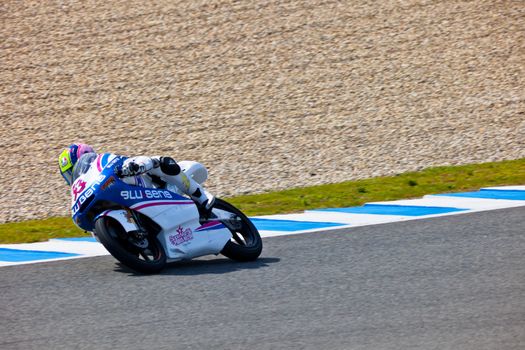 JEREZ DE LA FRONTERA, SPAIN - MAR 5:125cc pilot Sergio Gadea races on the official training of the world championship of MotoGP on Mar 5, 2011, in racetrack of velocity of Jerez de la Frontera, Spain