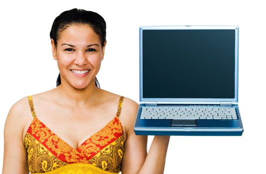 Close-up of a woman holding a laptop and smiling isolated over white