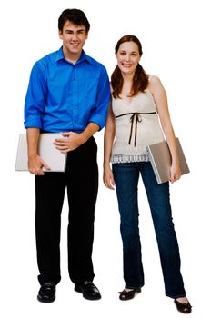 Portrait of a couple holding laptops and smiling together isolated over white