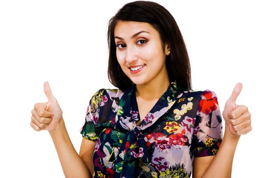 Confident woman showing thumbs-up sign and smiling isolated over white