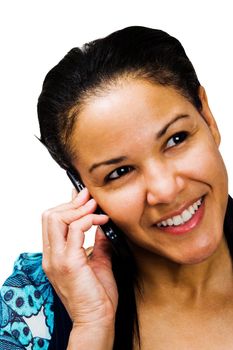 Woman talking on a mobile phone and smiling isolated over white