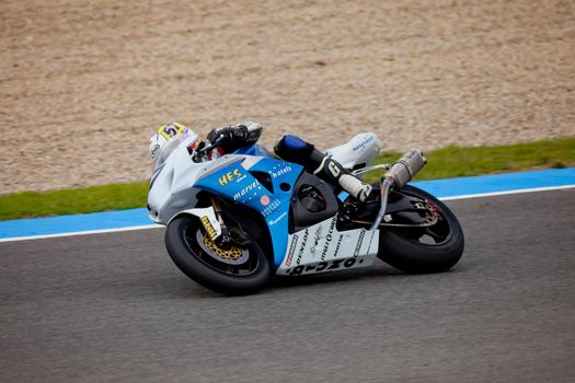 JEREZ DE LA FRONTERA, SPAIN - NOV 20: Stock Extreme motorcyclist Ferran Casas takes a curve in the CEV championship on Nov 20, 2010, in Jerez de la Frontera, Spain