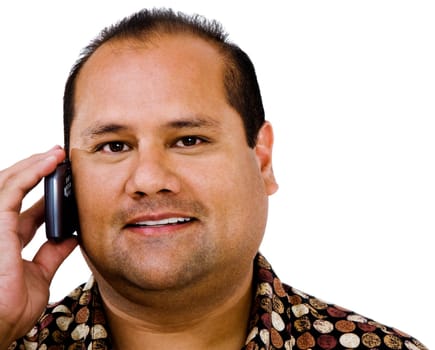 Smiling man talking on a mobile phone isolated over white