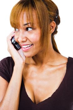 African woman talking on a mobile phone isolated over white
