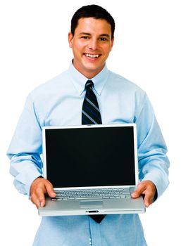 Businessman holding a laptop and smiling isolated over white
