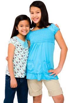 Portrait of two girls posing and smiling together isolated over white