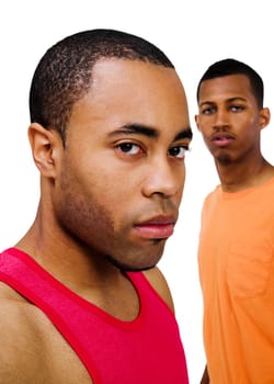 Close-up of two men posing isolated over white