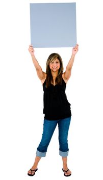 Woman showing a blank placard and smiling isolated over white