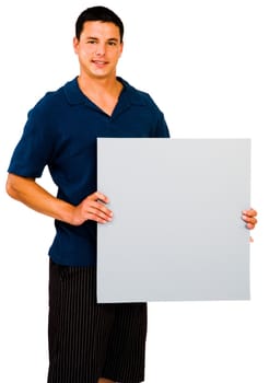 Smiling man showing an empty placard isolated over white