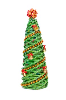 Knitted Christmas tree made of paper. Decorated with bells and chains with a star on top. Isolated on white.