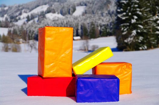 present parcels outside in a snowy landscape...