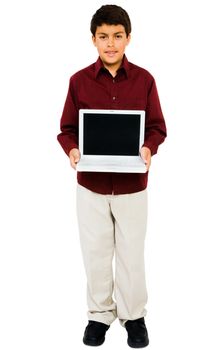 Boy showing a laptop isolated over white