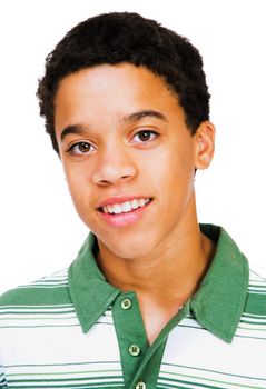 Portrait of a teenage boy smiling isolated over white