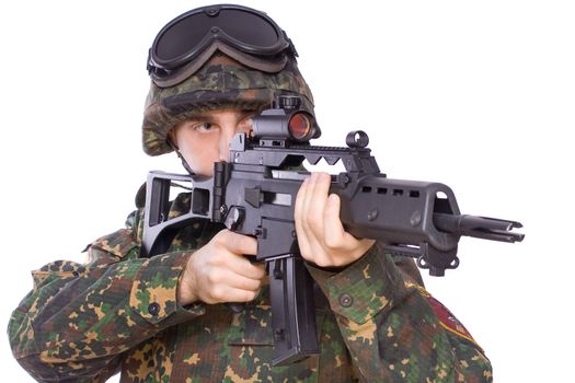one soldier with the gun in the hands on a white background
