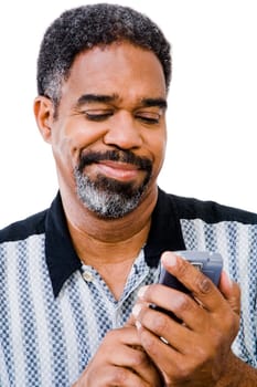 Mature man text messaging on a mobile phone isolated over white