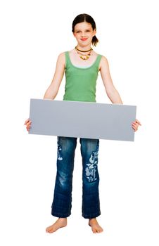 Portrait of a girl showing a placard and smiling isolated over white