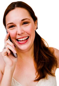 Portrait of a woman talking on a mobile phone isolated over white