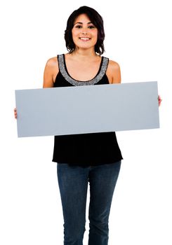 Beautiful woman showing an empty placard isolated over white