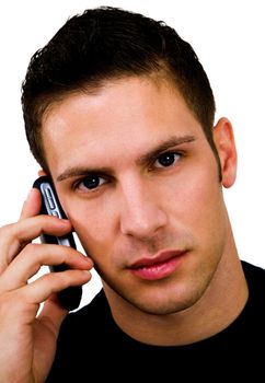 Portrait of a man talking on a mobile phone isolated over white