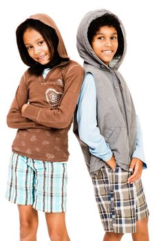 Portrait of two children standing together and smiling isolated over white