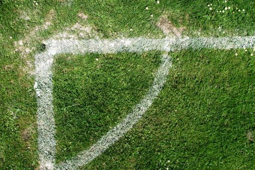 soccer field close-ups of markings on a sunny day